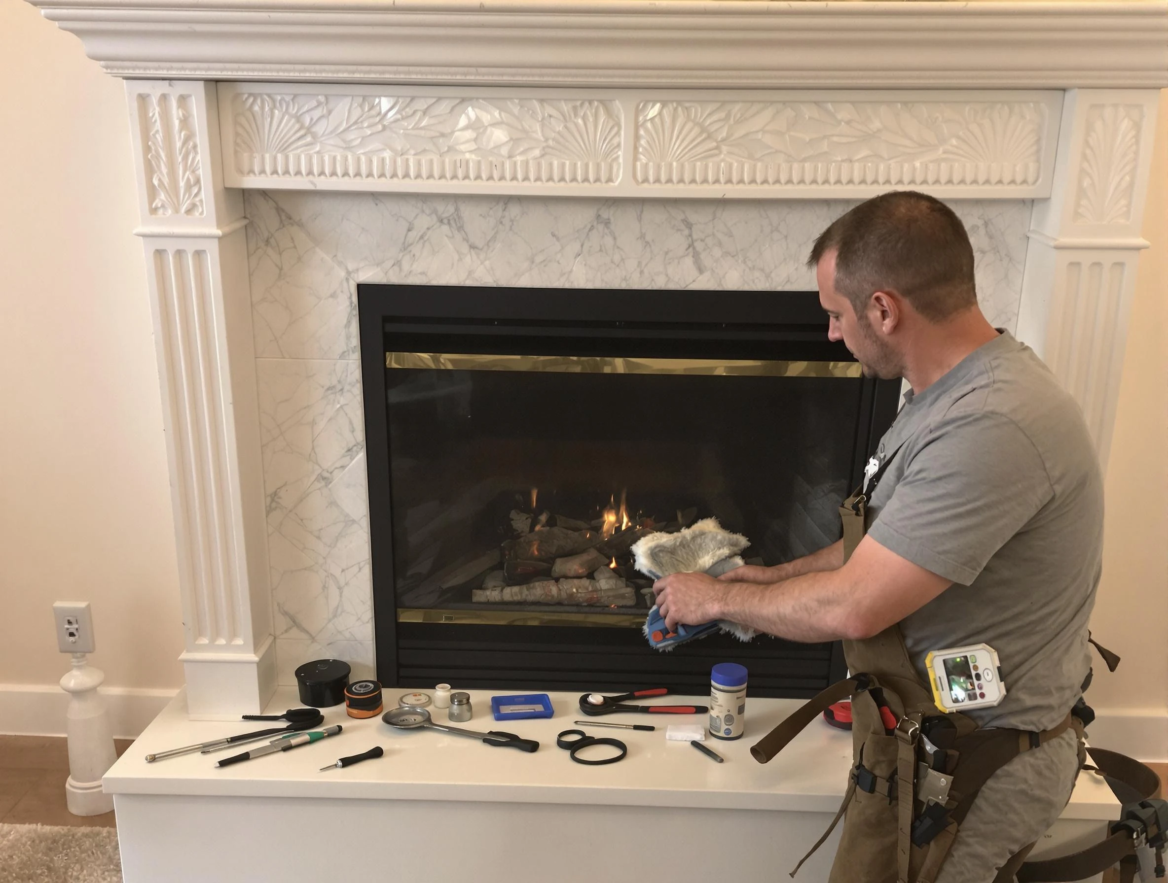 Ohio Chimney Sweep performing fireplace maintenance in Ohio, PA